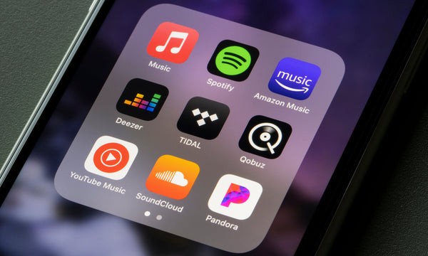 Musik-Apps auf einem Handy wie Tidal, Spotify, Apple Music und mehr