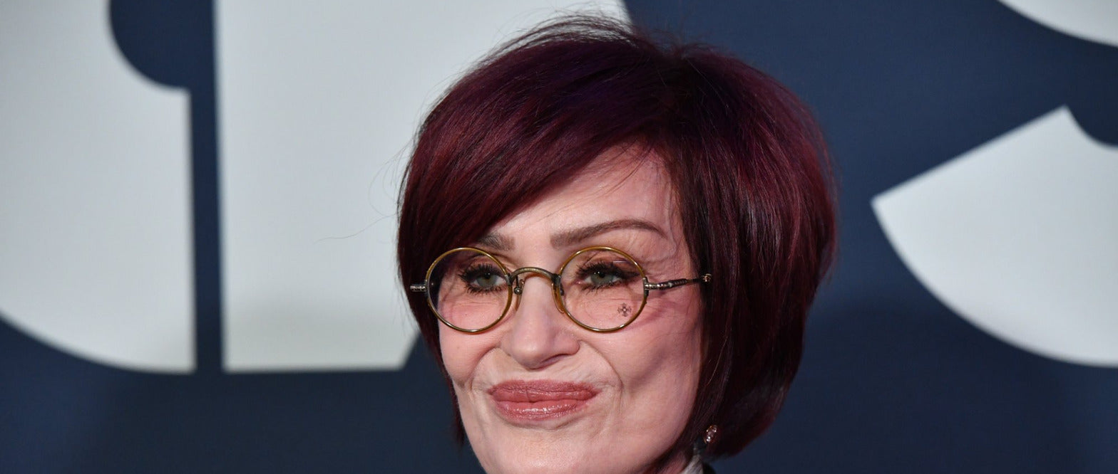Sharon Osbourne smiles